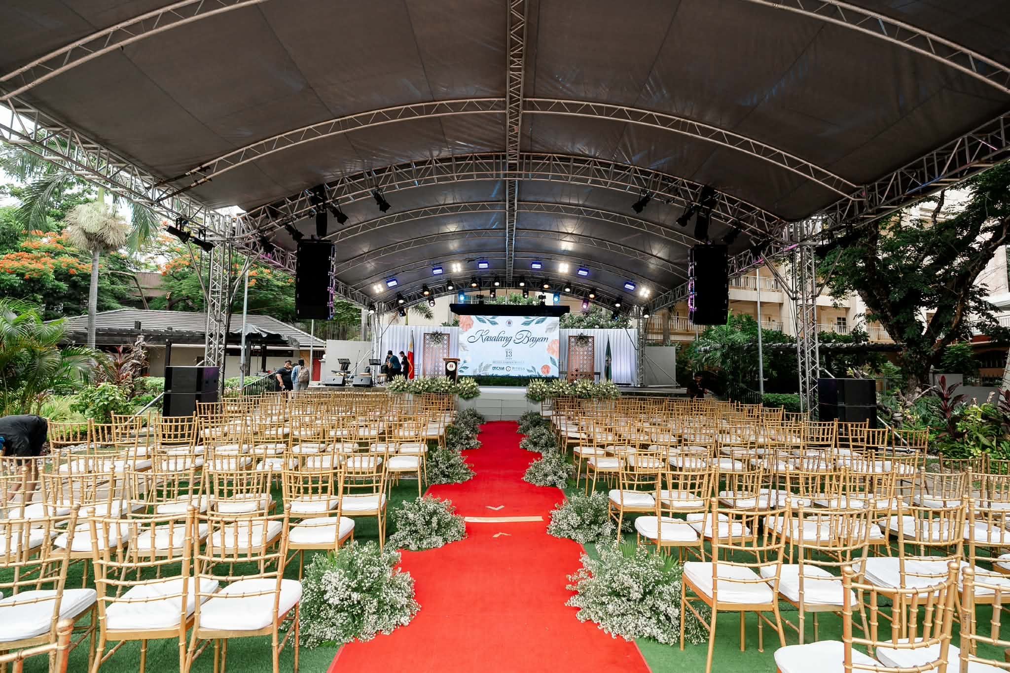 Ceremony set under a truss canopy at Mehan Garden, Manila